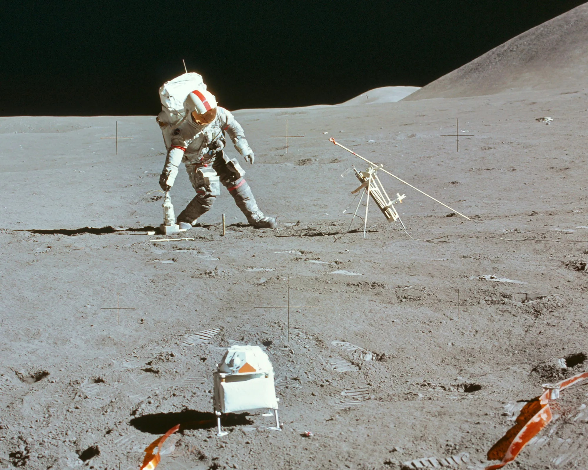 Astronaut on the moon setting up communication instruments, representing BESV MY26’s smart connectivity and mission-driven design